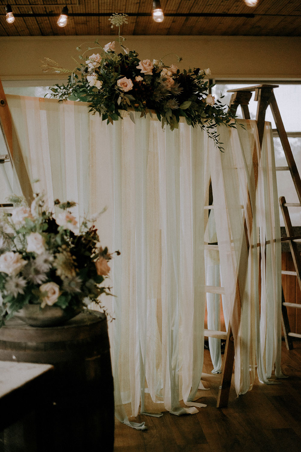 detail photography of wedding arch