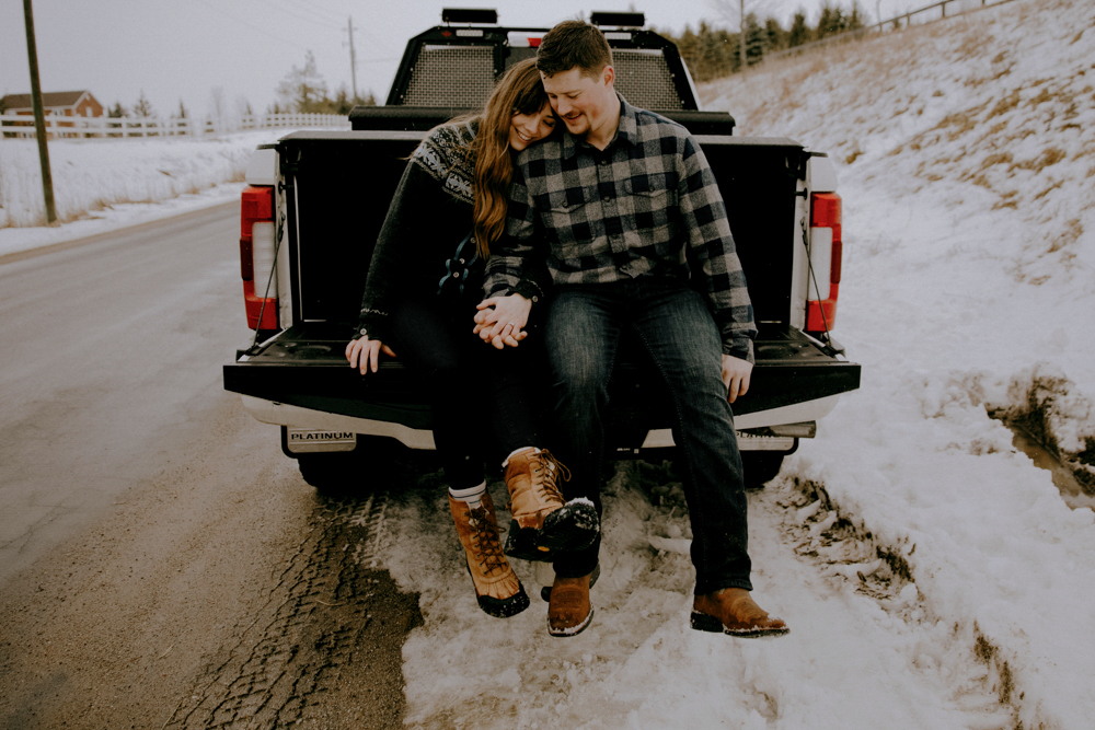 innisfil_engagement photography on back of pick up truck