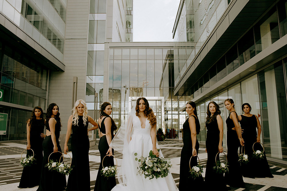 vaughan bride and groom candidly with bridal party