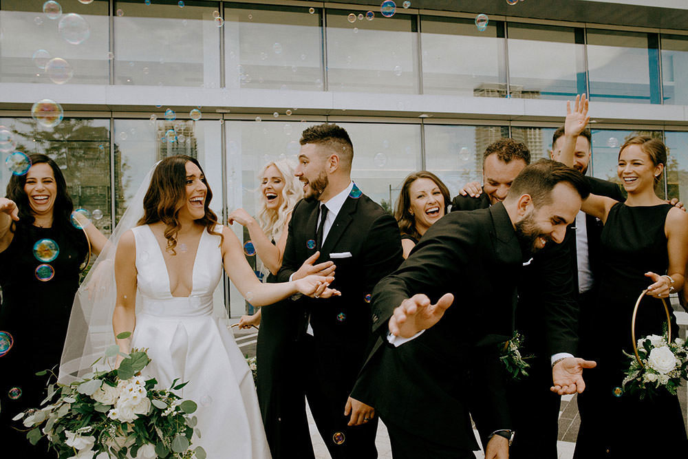 toronto bridal party portraits of them laughs together