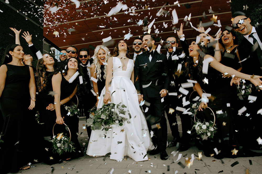 toronto bridal party portraits of group laughing together