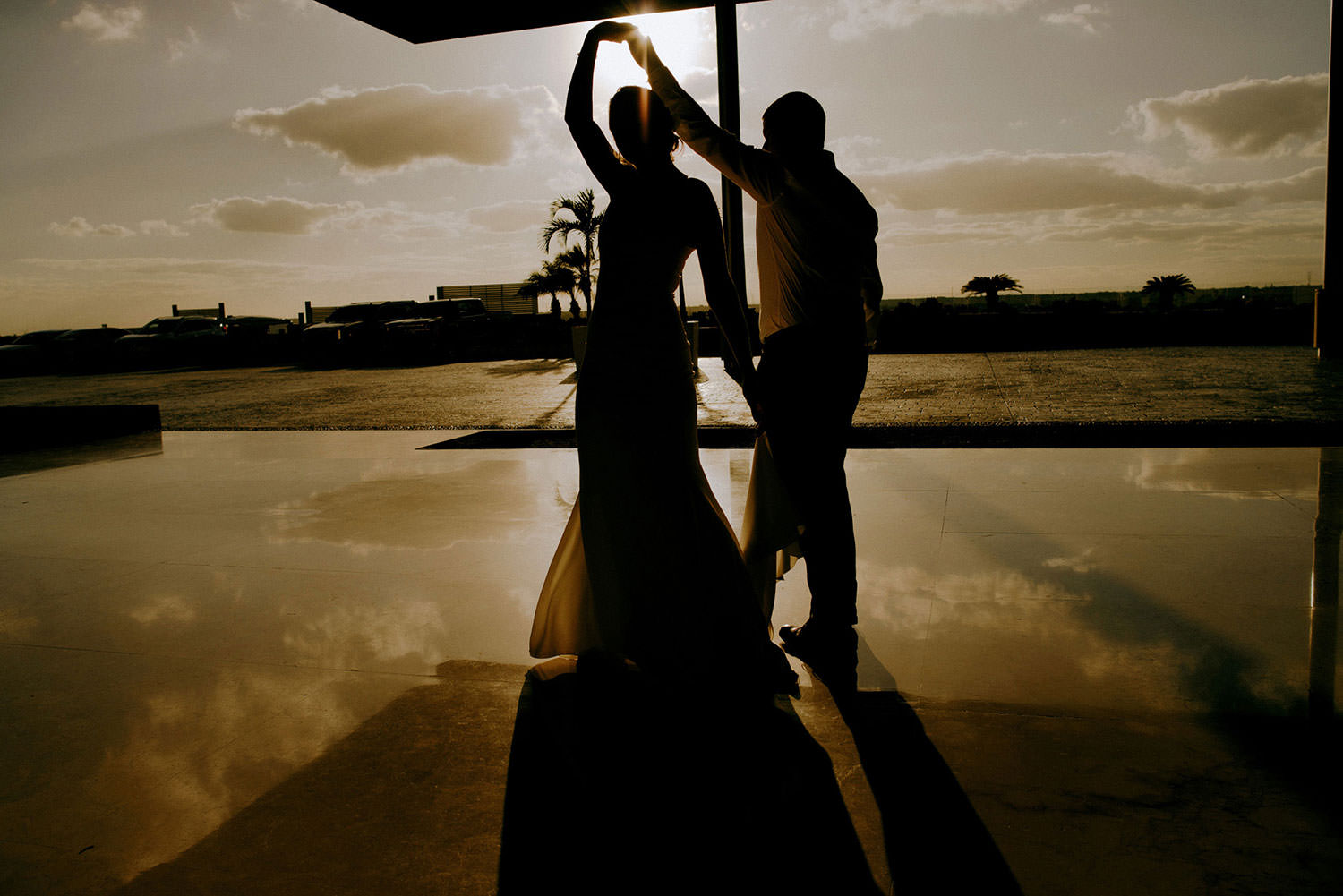 Royalton Riviera Cancun Wedding Photography of bride and groom dancing in silhouette