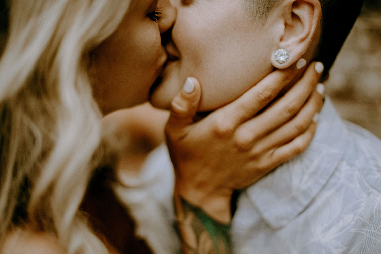 Toronto Gooderham Building Ontario photography of two women in love kissing before the camera