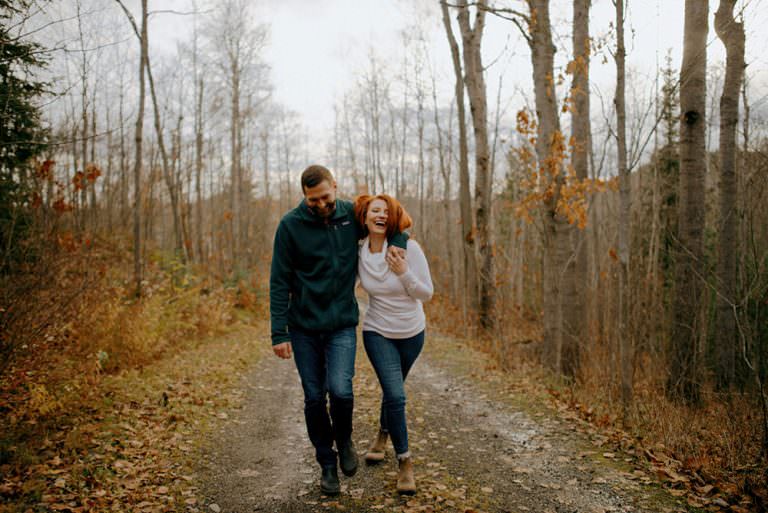 Fairbanks Ontario engagement photography of couple laughing candidly together