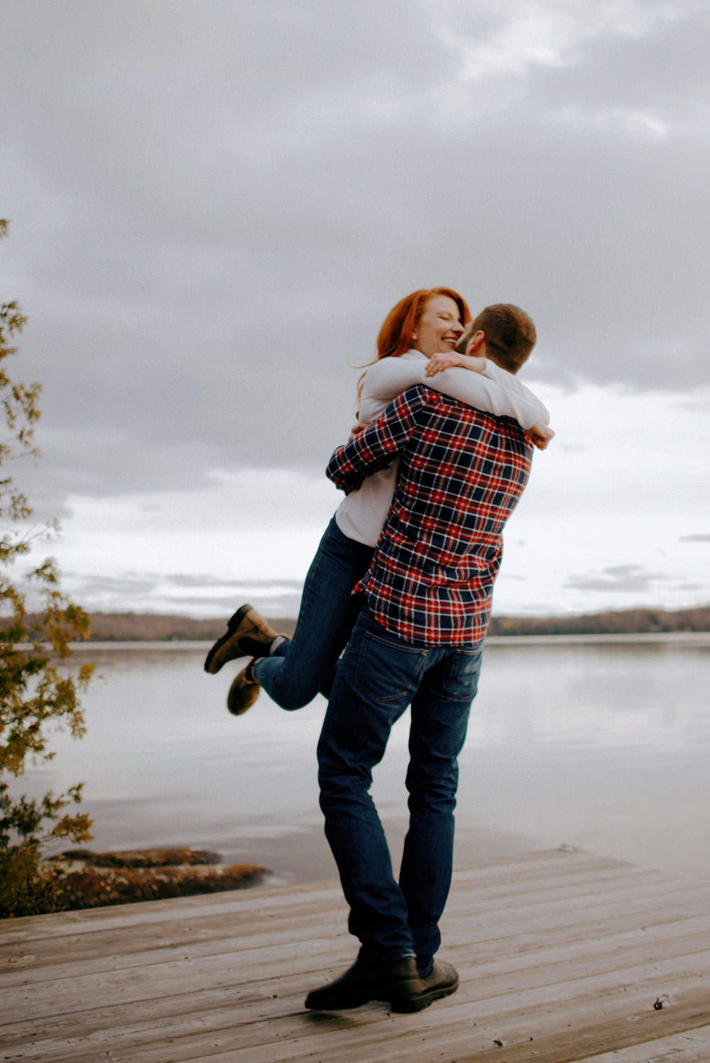 Fairbanks Ontario engagement photography of couple laughing candidly together