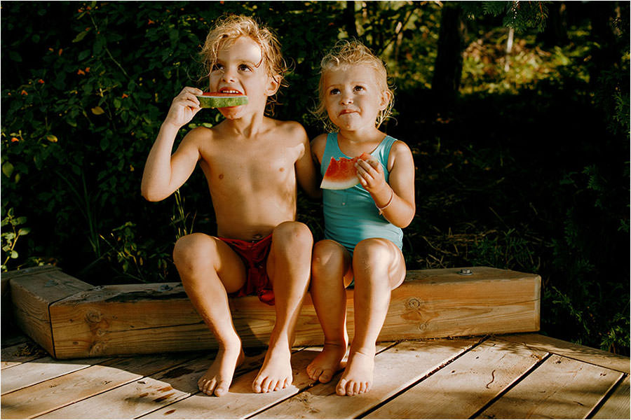 Sudbury family photography with a cute family eating watermelon