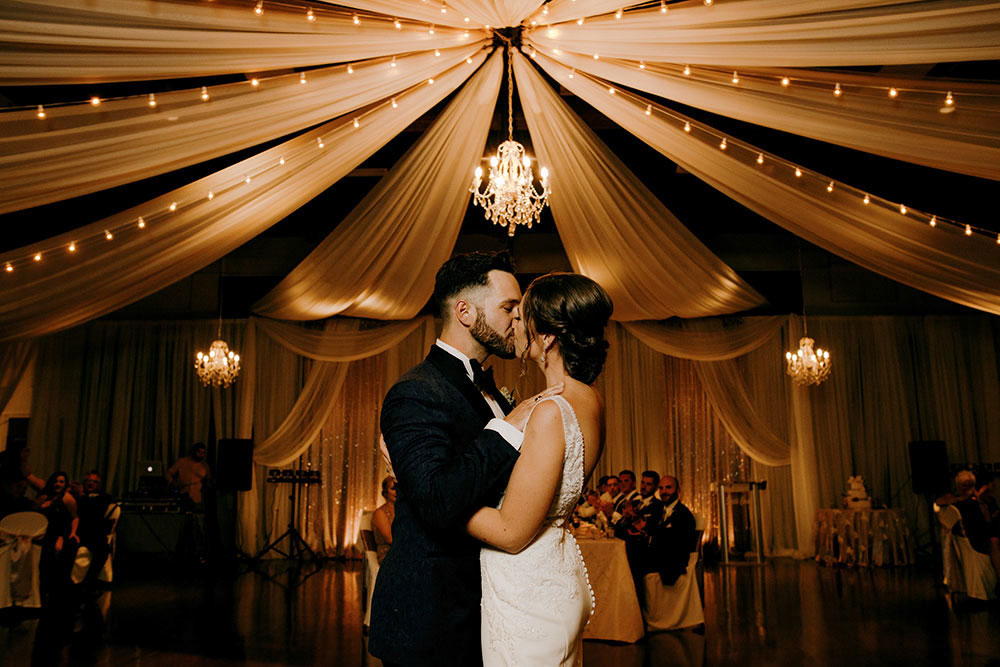 Best Wedding reception Photography of bride and groom sharing first dance