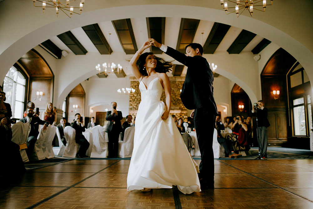 Best Wedding reception Photography of bride and groom sharing first dance at the fairmont lake louise