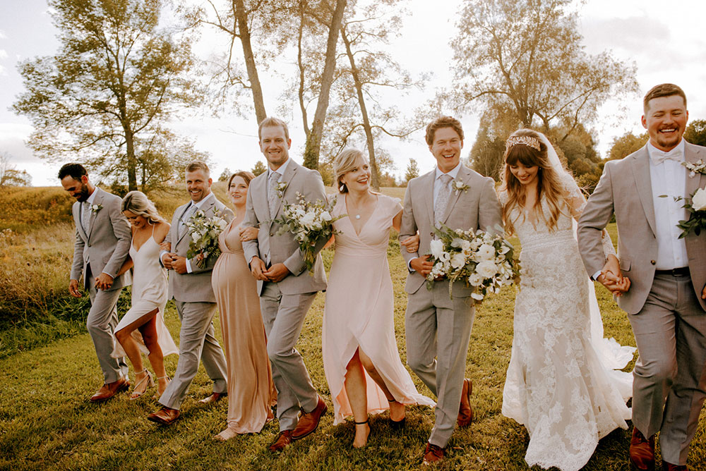 bridal party walks together at the Heritage View Barn Wedding