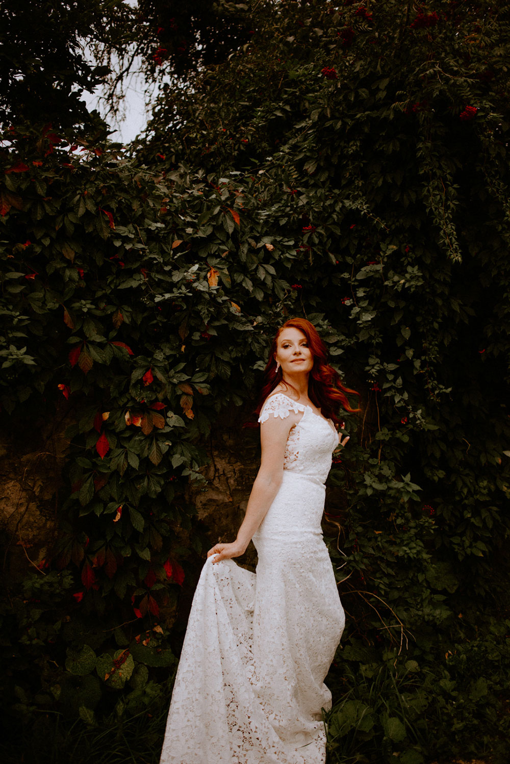 elora mill hotel elopement bride swinging hair back and forth