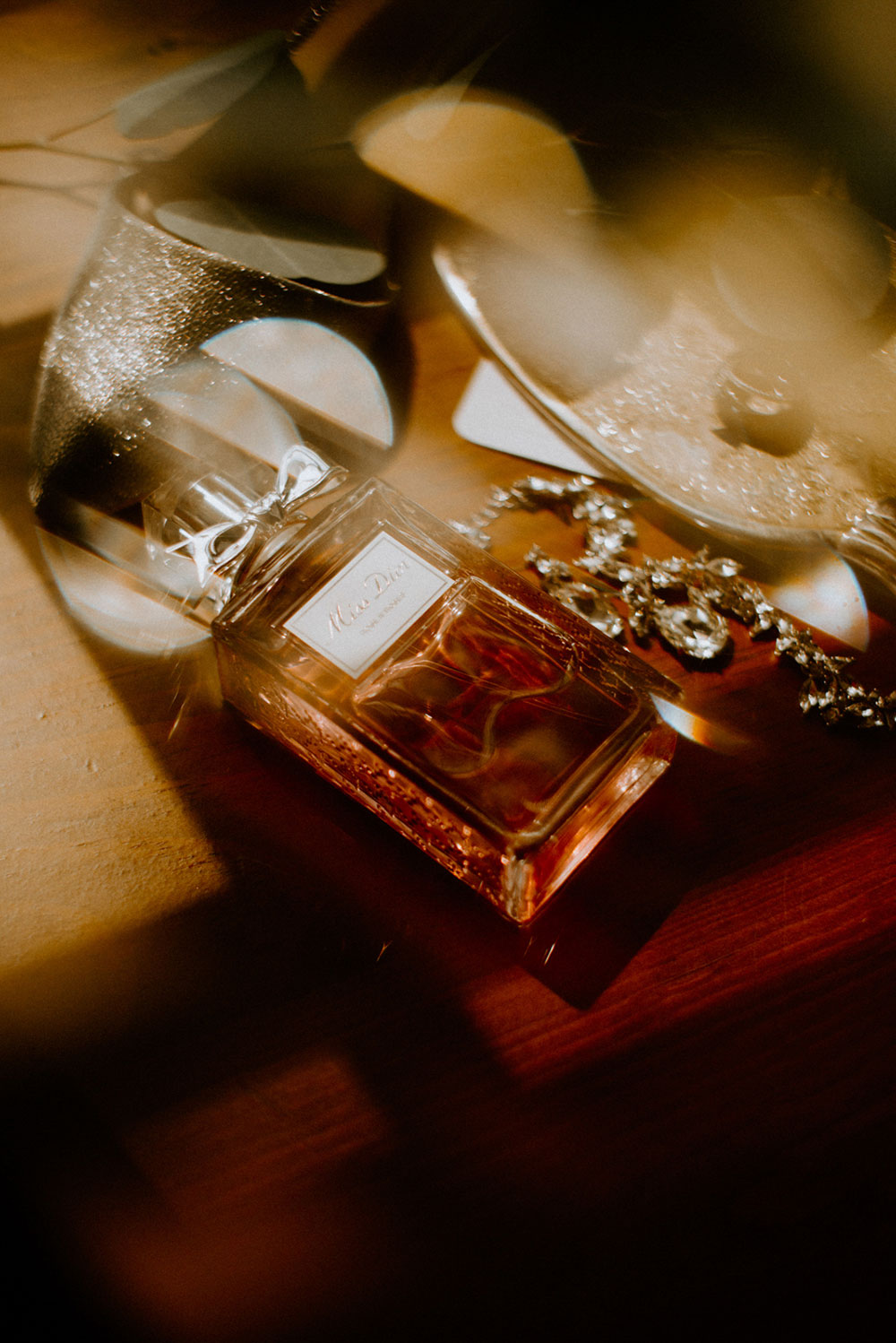 elora mill hotel elopement detail photography of miss dior perfume bottle