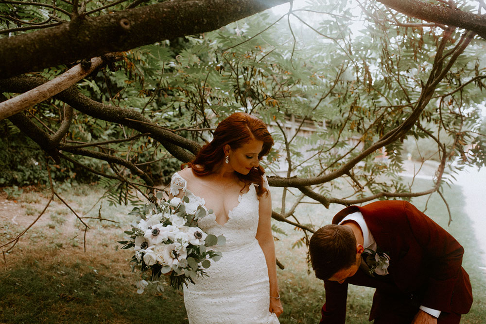 elora mill hotel elopement bride and groom walk through victoria park 