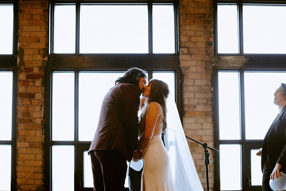 The Burroughes Toronto Wedding couple say their vows at ceremony