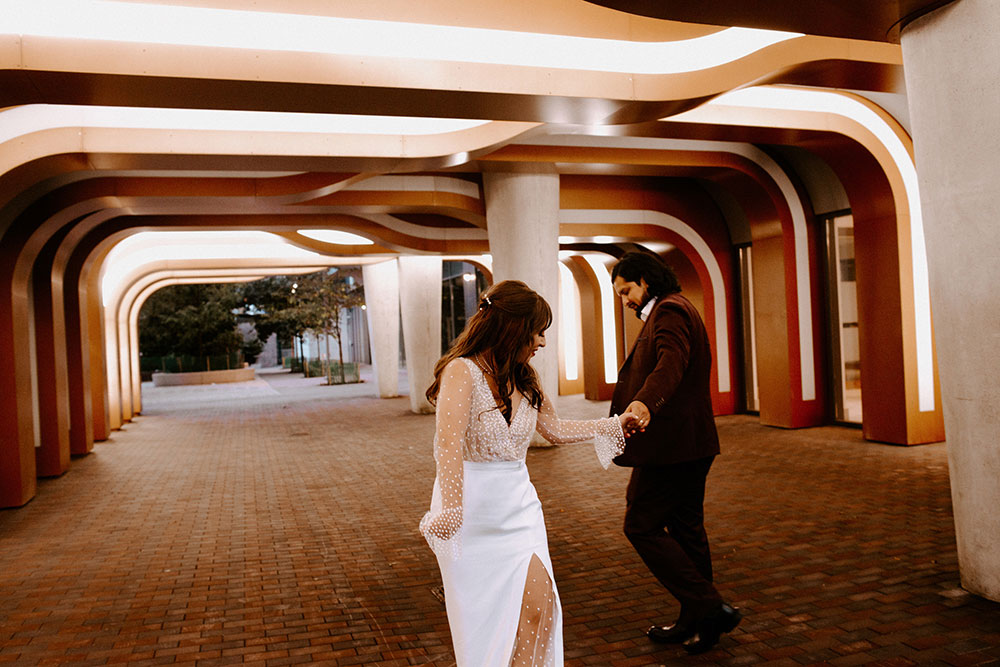 The Burroughes Toronto Wedding Couple candidly run around the streets of Toronto