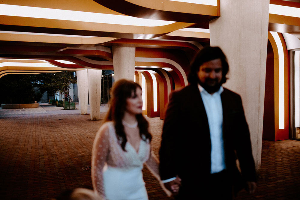 The Burroughes Toronto Wedding Couple candidly run around the streets of Toronto