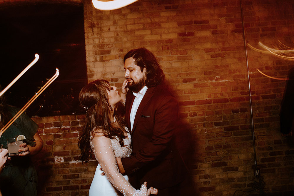 The Burroughes Toronto Wedding Couple celebrate during wedding reception