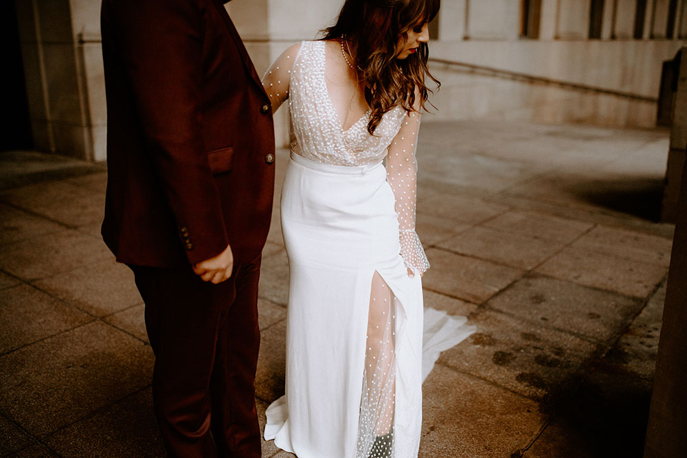 The Burroughes Toronto Wedding couple walk around Union station candidly