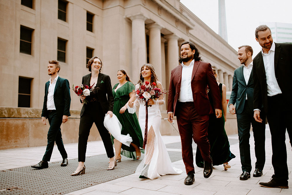 The Burroughes Toronto Wedding couple walk candidly at union station