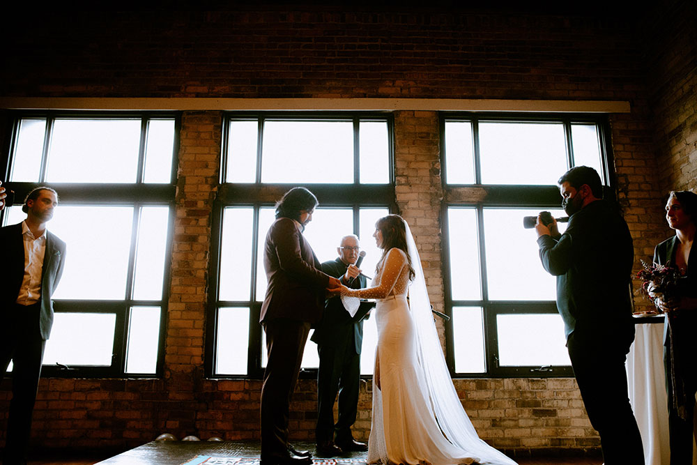 The Burroughes Toronto Wedding couple say their vows at ceremony