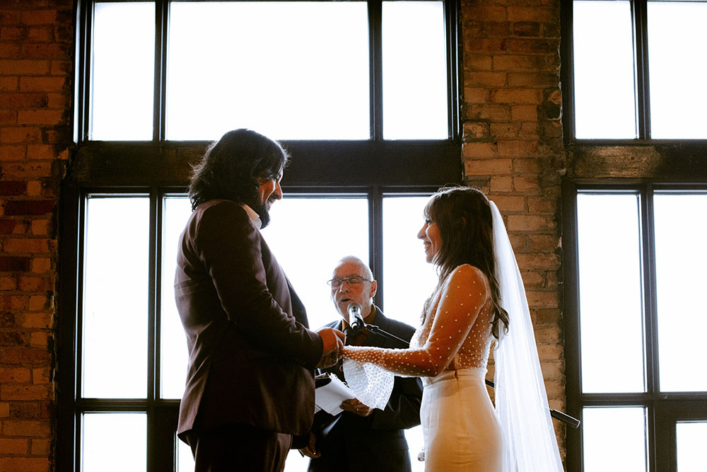 The Burroughes Toronto Wedding couple say their vows at ceremony