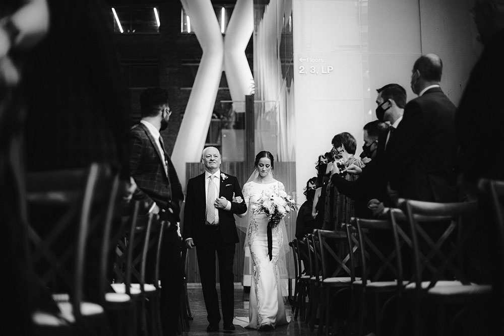 Ricarda's Atrium Toronto Wedding bride walks down aisle during ceremony