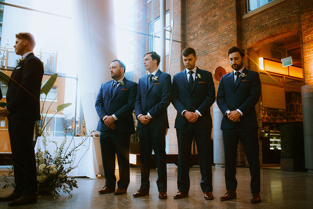 Ricarda's Atrium Toronto Wedding bride & groom stand at alter 