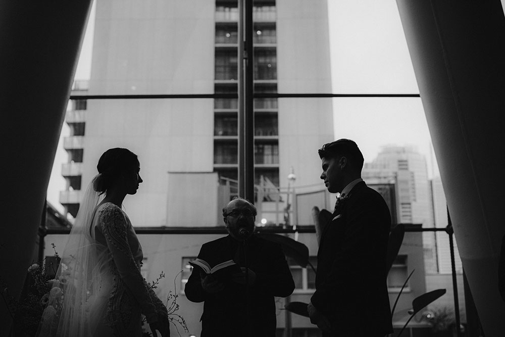 Ricarda's Atrium Toronto Wedding bride & groom stand at alter 