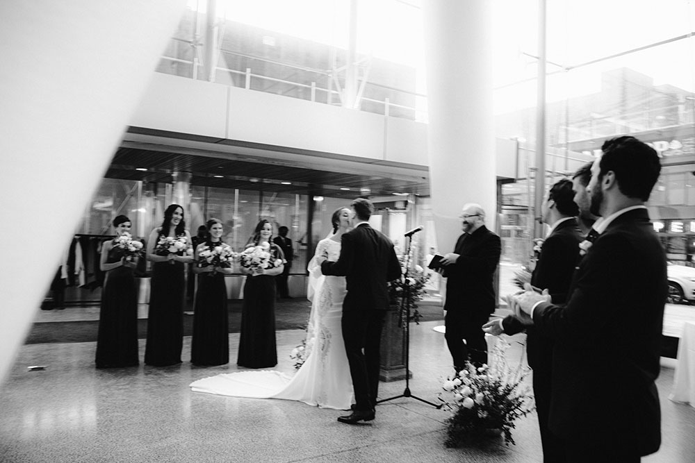 Ricarda's Atrium Toronto Wedding bride & groom stand at alter 