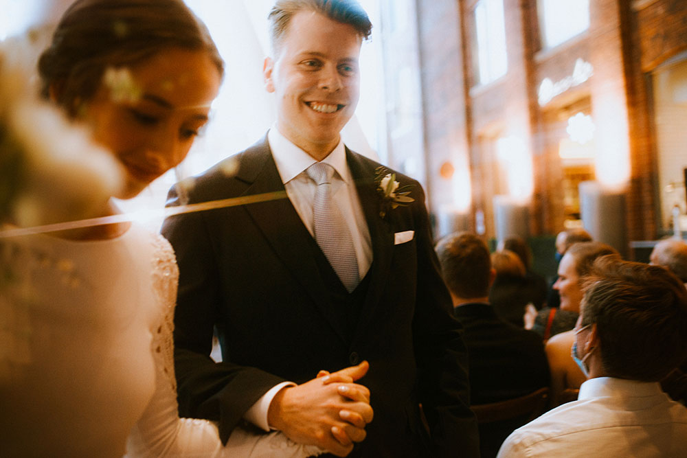 Ricarda's Atrium Toronto Wedding bride & groom stand at alter 