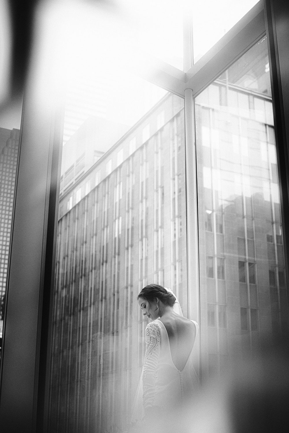 Shangri-La Hotel Toronto Wedding bride poses in museum room