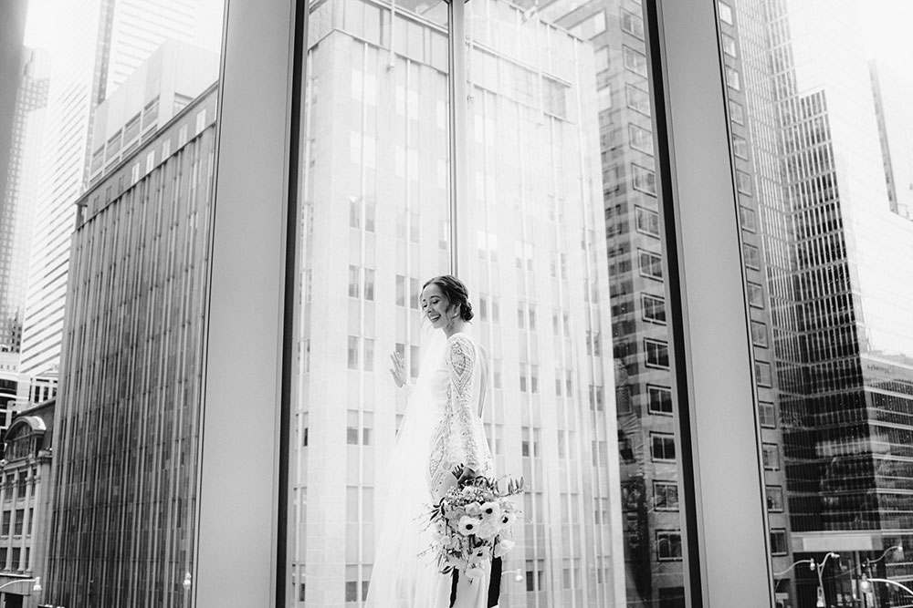 Shangri-La Hotel Toronto Wedding bride poses in museum room