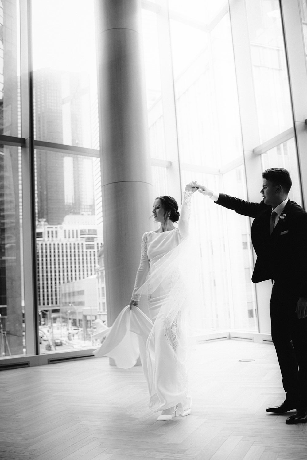 Shangri-La Hotel Toronto Wedding bride & groom dance in museum room