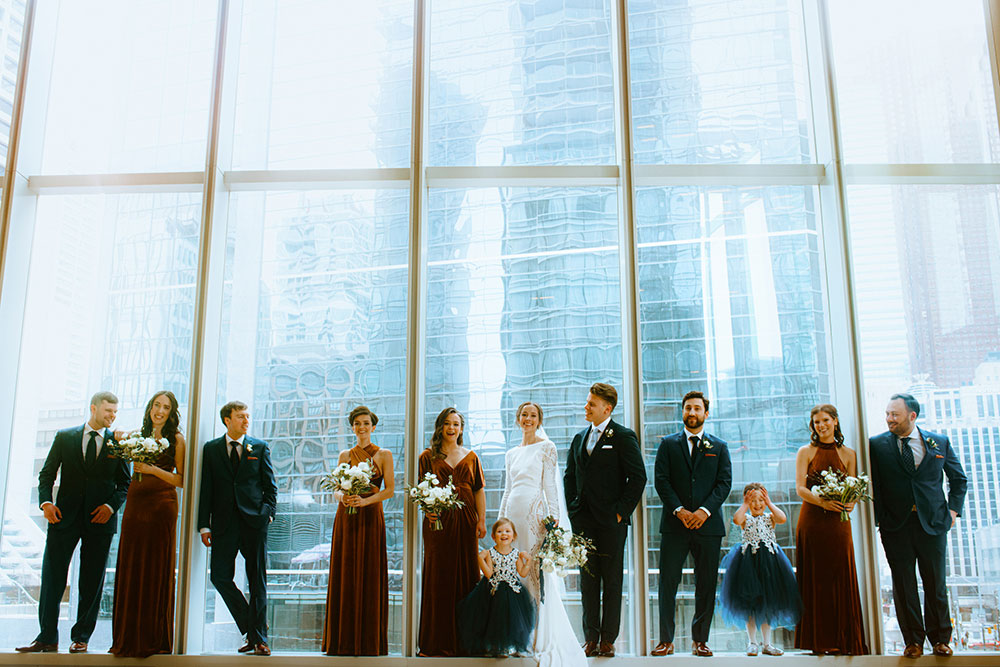 Shangri-La Hotel Toronto Wedding bridal party stands together by window