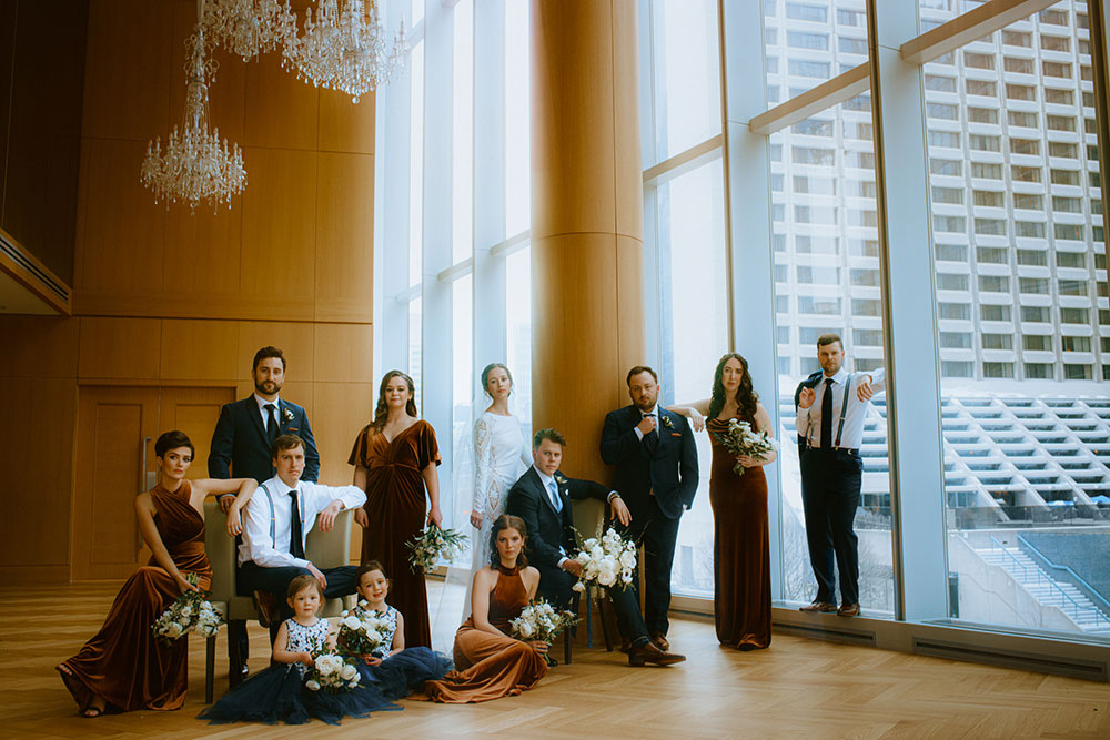 Shangri-La Hotel Toronto Wedding bridal party stands together by window