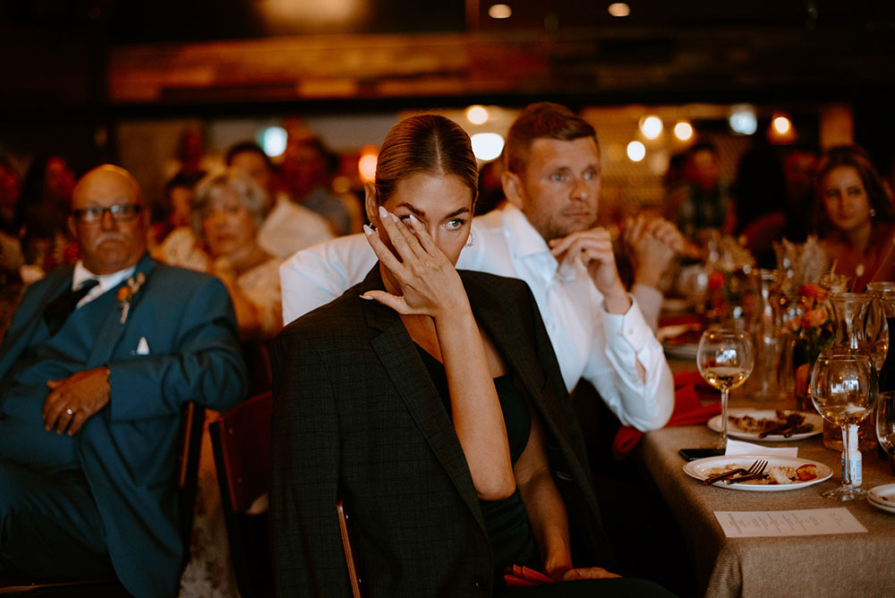 guests get emotional during wedding speeches at Respect is Burning Kitchen 