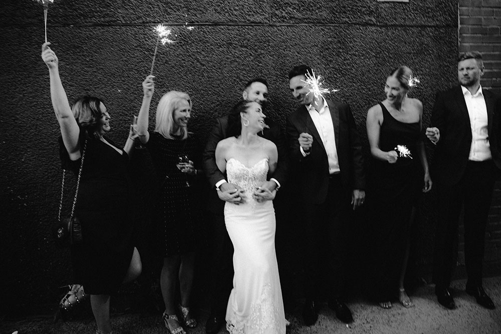 black and white photo of wedding guests at Respect is Burning Kitchen 