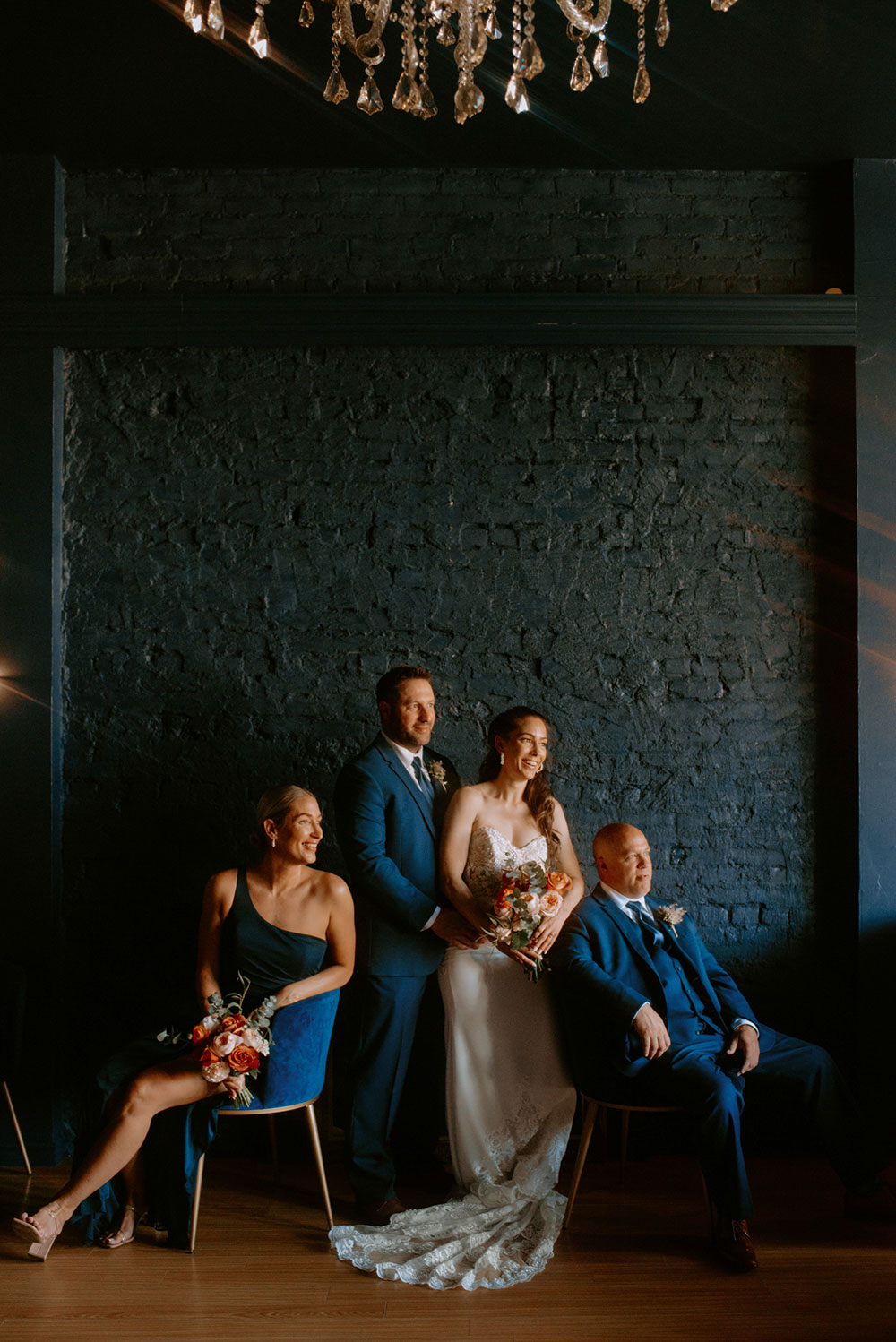 wedding party pose for a portrait at the cedar nest in sudbury