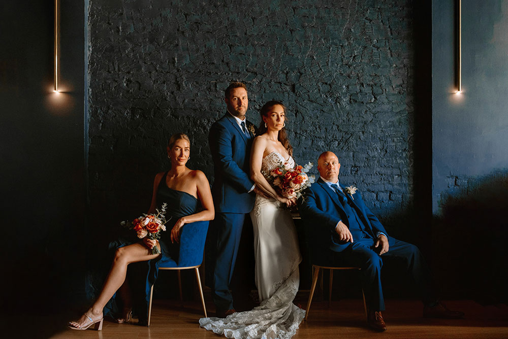 wedding party pose for a portrait at the cedar nest in sudbury