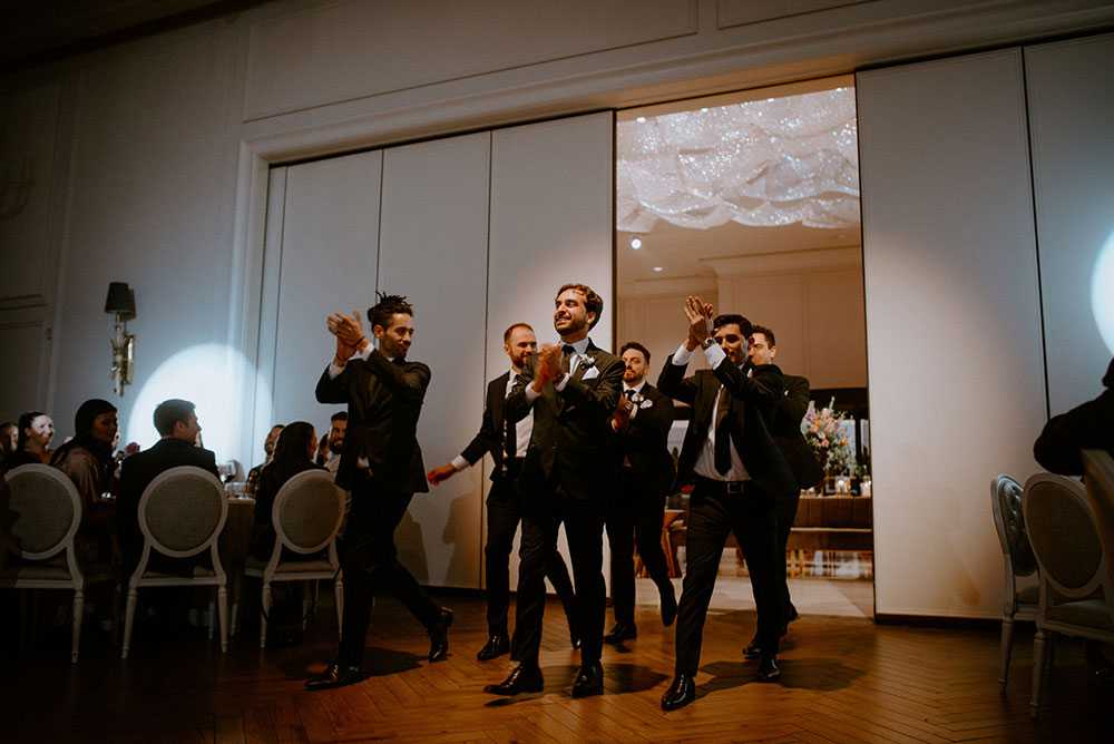 groomsmen enter to music and cheering at the Arlington Estate wedding