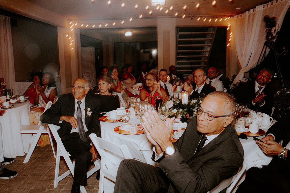 guest clap for the newlyweds at this Bayview Golf Wedding