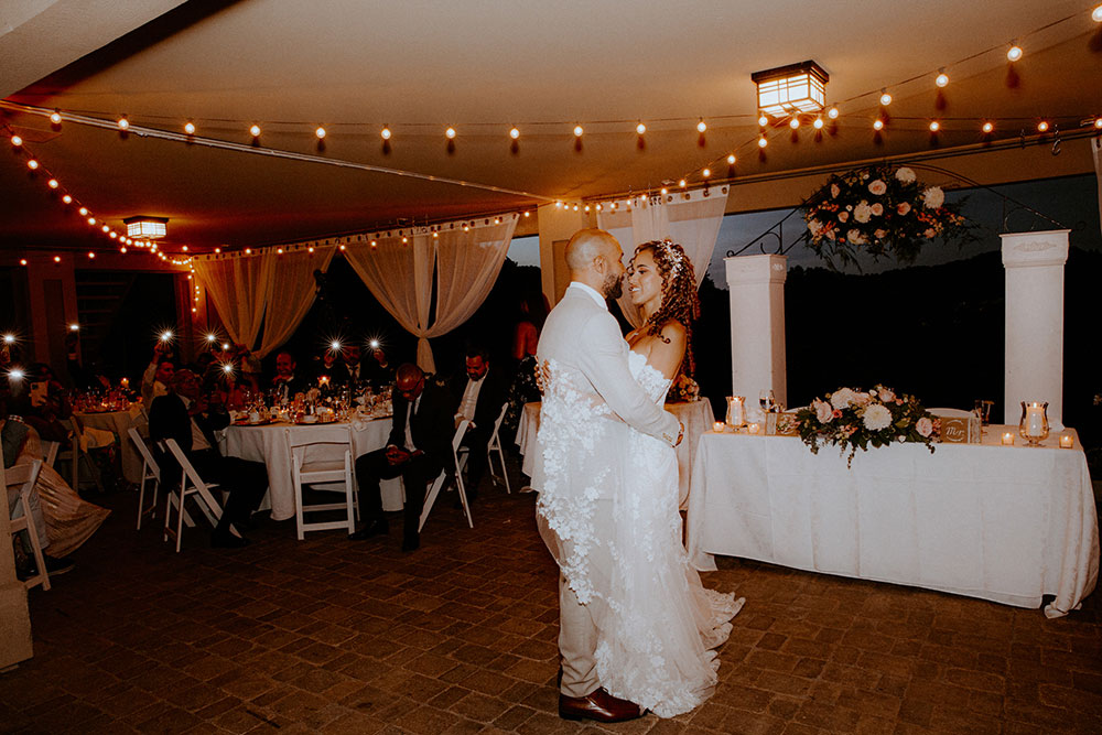 first dance as husband and wife bridal party does a choreographed dance together at this Bayview Golf Wedding