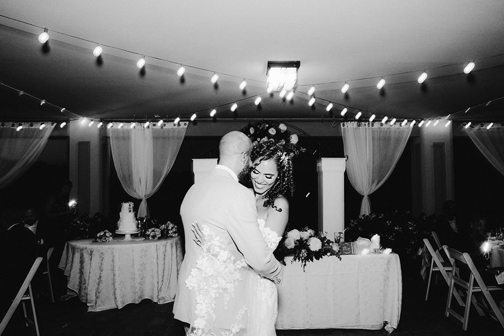 the first dance as newlyweds bridal party does a choreographed dance together at this Bayview Golf Wedding