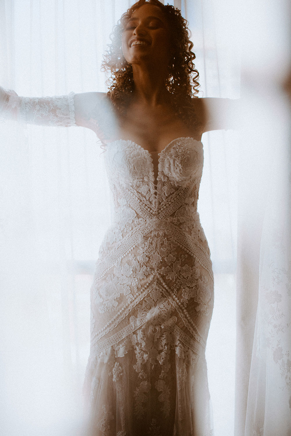 bride poses in her Martina Liana gown at this Bayview Golf Wedding