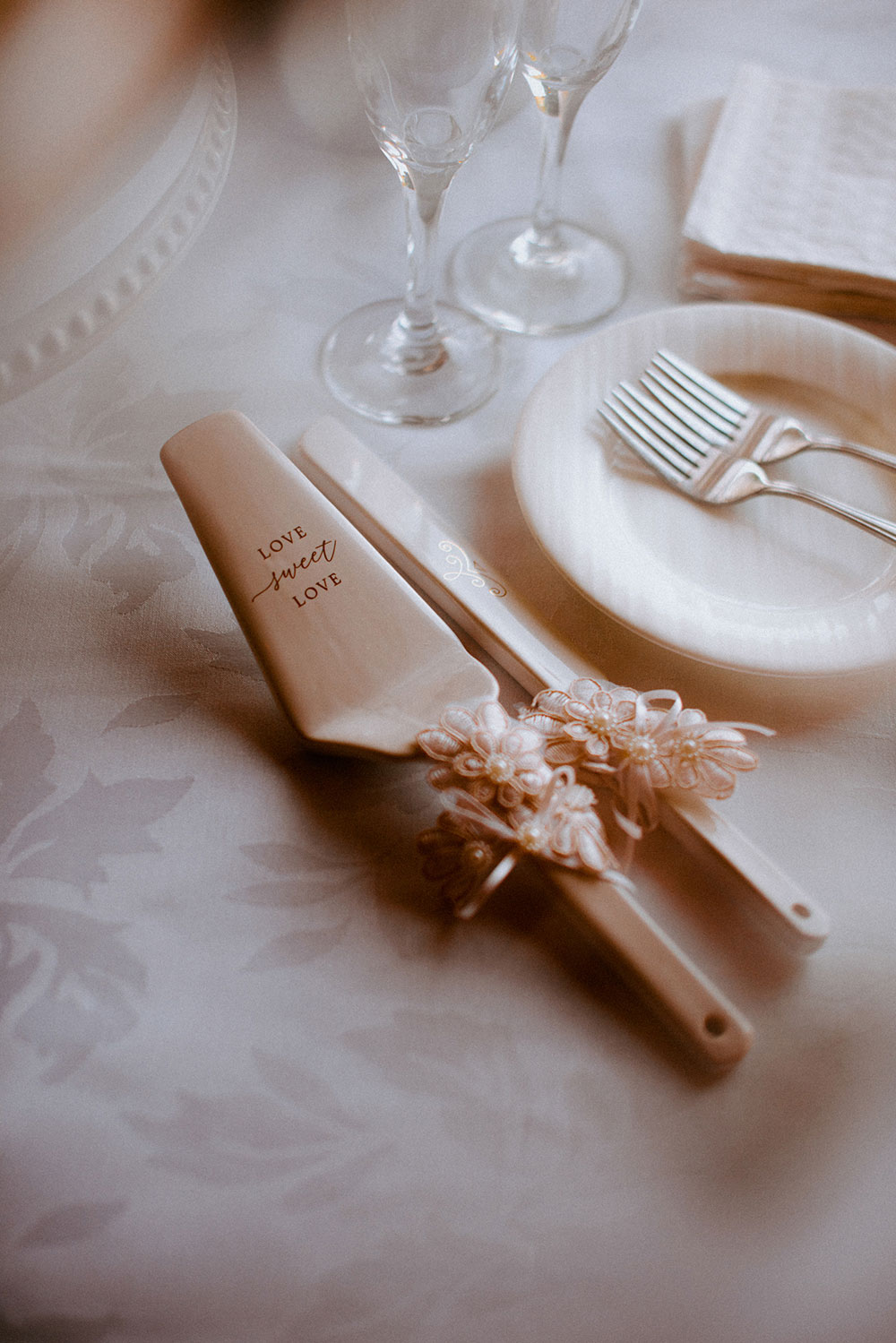 cake cutting knife with words, love sweet love at this Bayview Golf Wedding