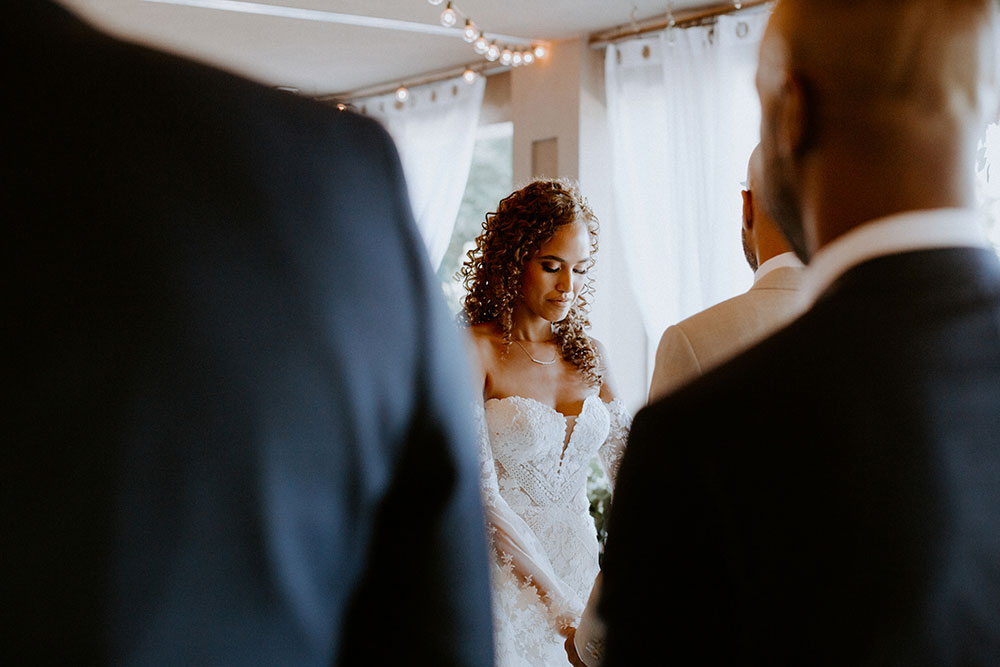 bride at the alter at this Bayview Golf Wedding