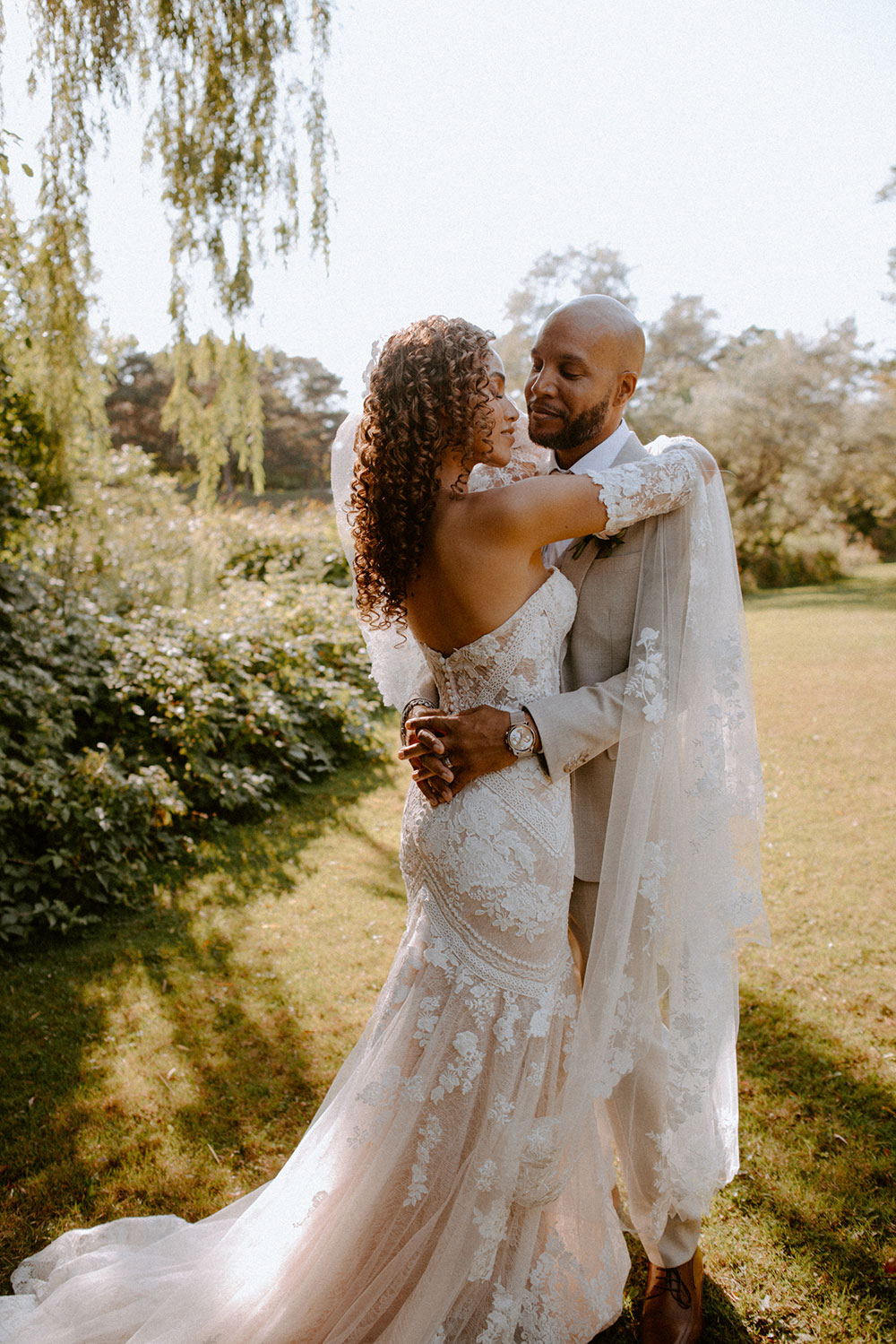 sunset portrait of the bride and groom drive at this Bayview Golf Wedding