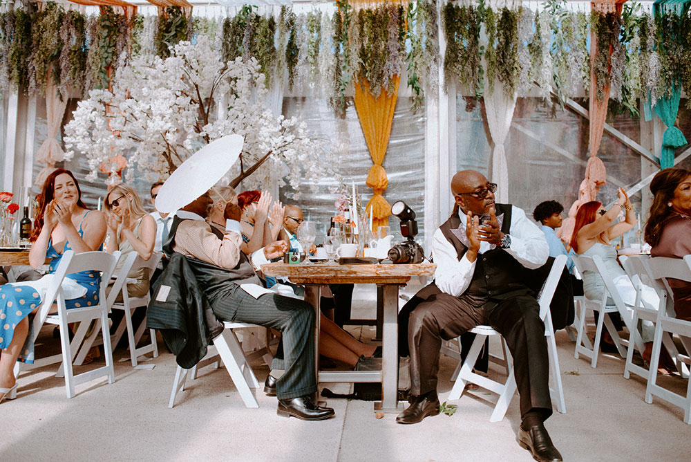 guests clap at the Catana Estate