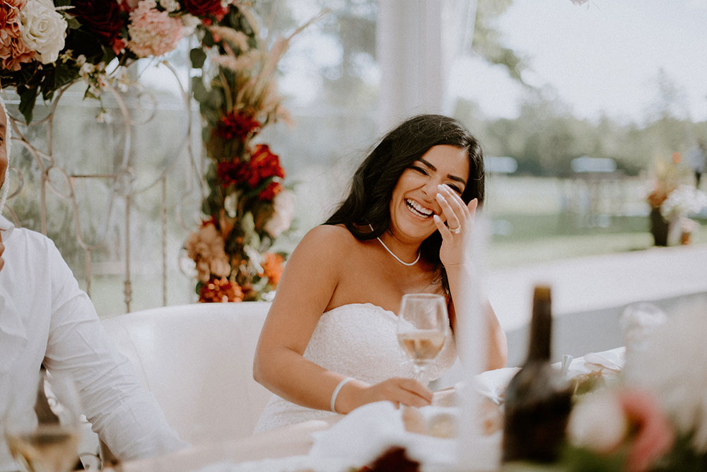 bride laughs at the Catana Estate