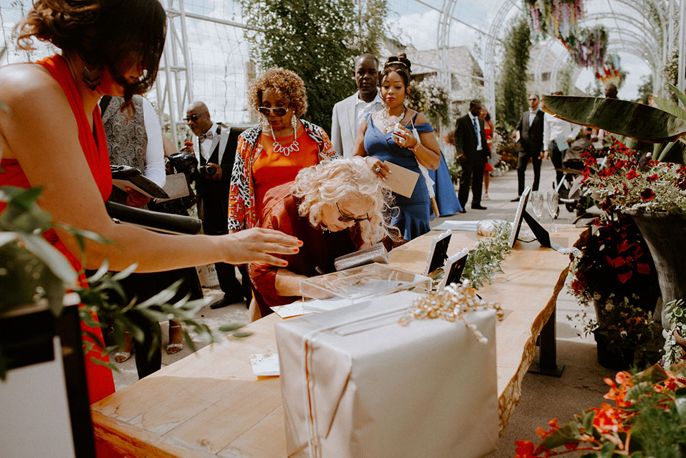 guests sign the guest book at the Catana Estate