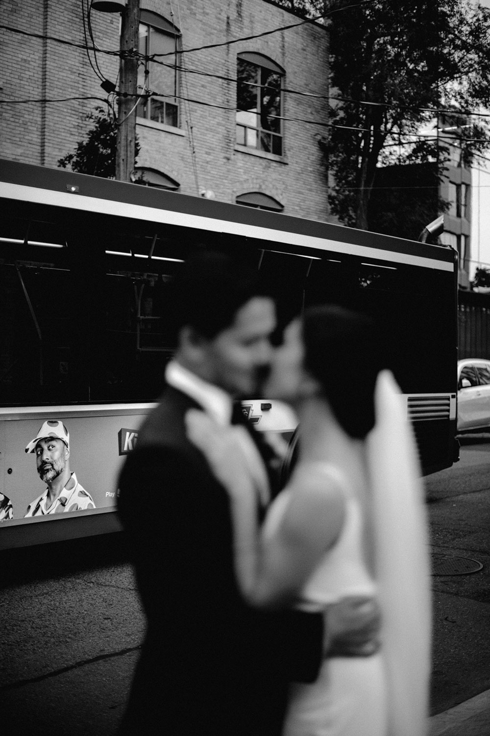 mildred's temple kitchen wedding photography of the wedding couple being candid around liberty village at sunset